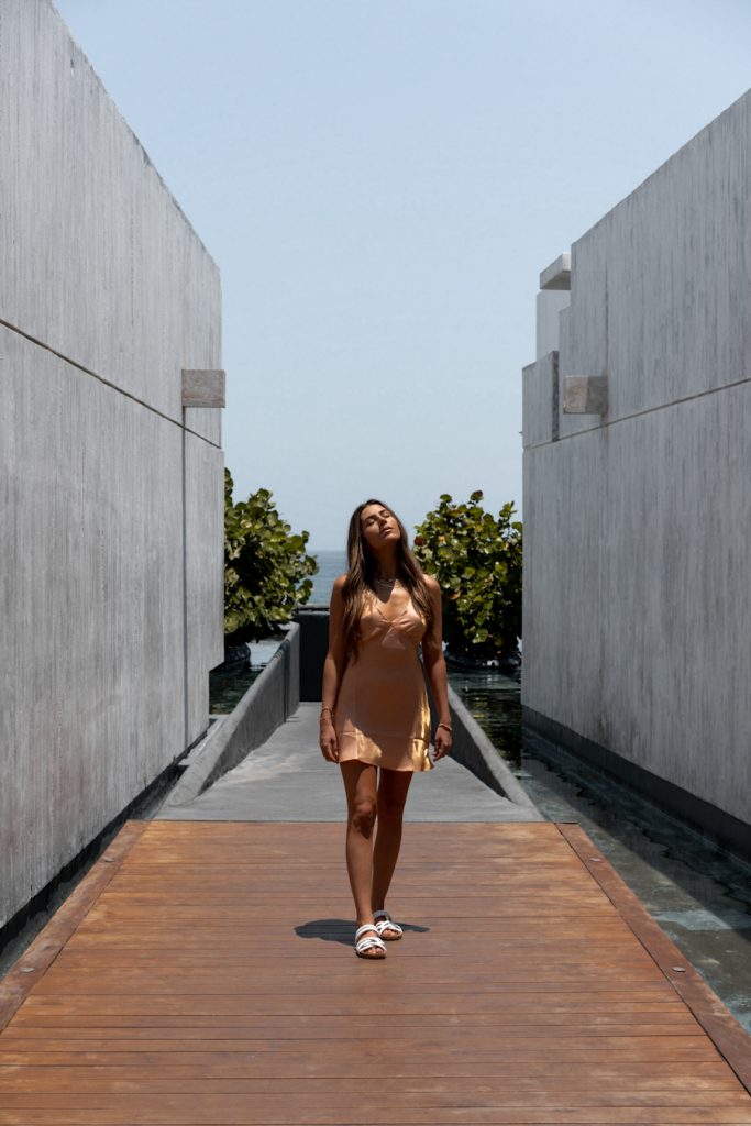Shylah may in orange dress at the viceroy hotel